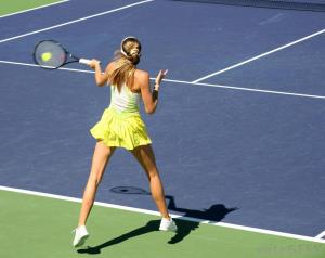 woman-hitting-tennis-ball.jpg