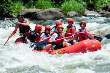 A-group-enjoying-a-white-water-rafting-trip.jpg